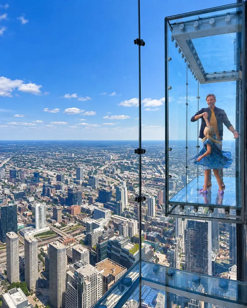A stylized image of a father and daughter standing inside a high-altitude glass observation box overlooking a sprawling city skyline.
