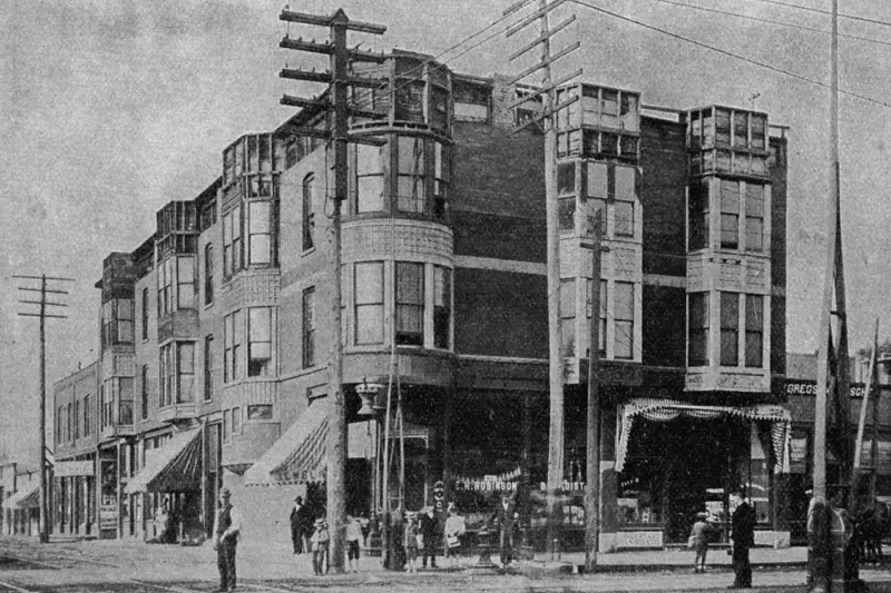 Historical black and white photograph of H.H. Holmes' retail building located on 63rd Street in Englewood during the late 19th century.